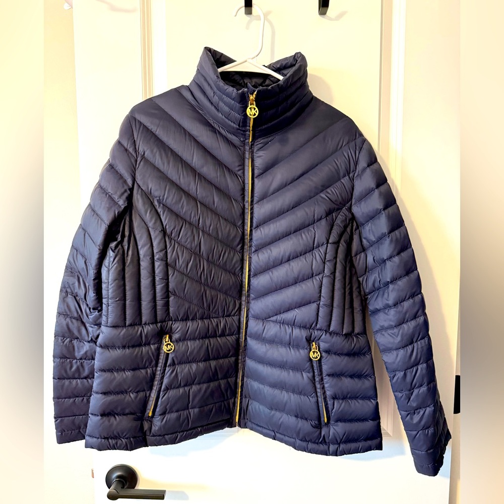 XL Blue Michael Kors packable down coat.